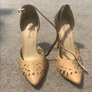Gold and nude pumps